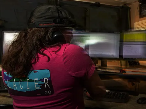 scene of a late-night shift at an EMT dispatcher's desk - GRAVEYARD SHIFT<br>by Shoshauna Shy